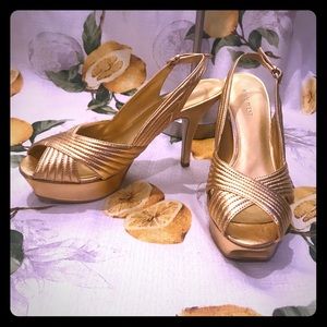 Gold Nine West sling back platform heels
